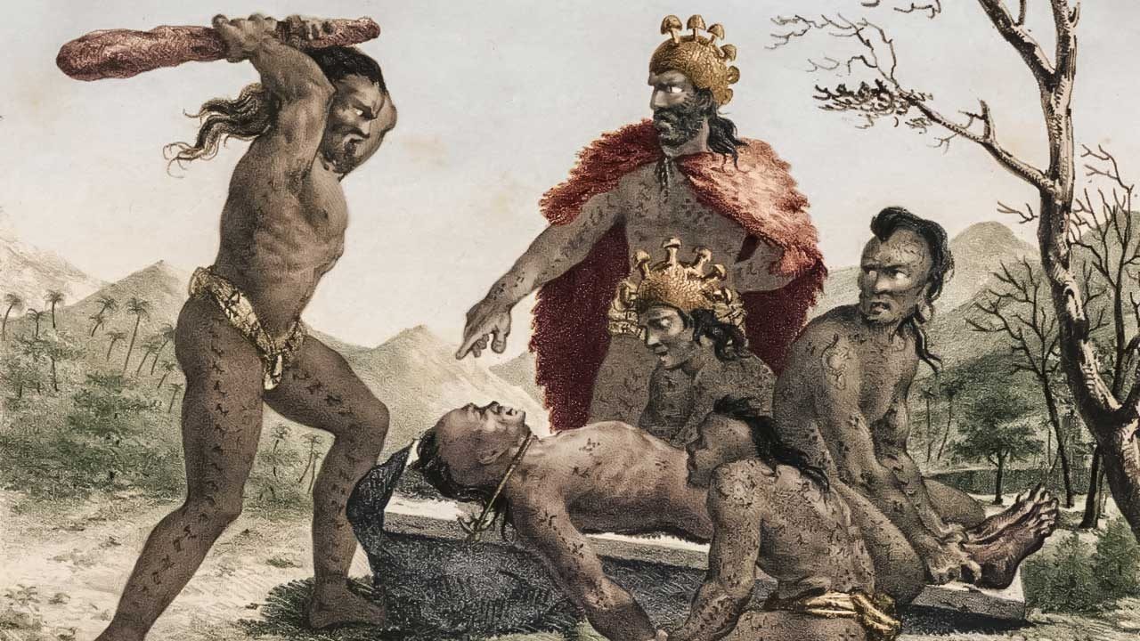 Old color illustration featuring a group of men dressed in loincloths. One man is laid out on a stone slab. Another man raises a club above his head as if to strike the man on the slab. Another man, dressed in royal clothes, points down at the man on the slab, as if to indicate where to strike.
