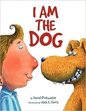 Cover of book I am the dog. Illustration of boy and dog face to face.
